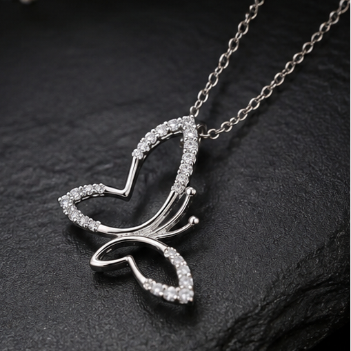 Cute Butterfly Pendant in Sterling Silver with Moissanite