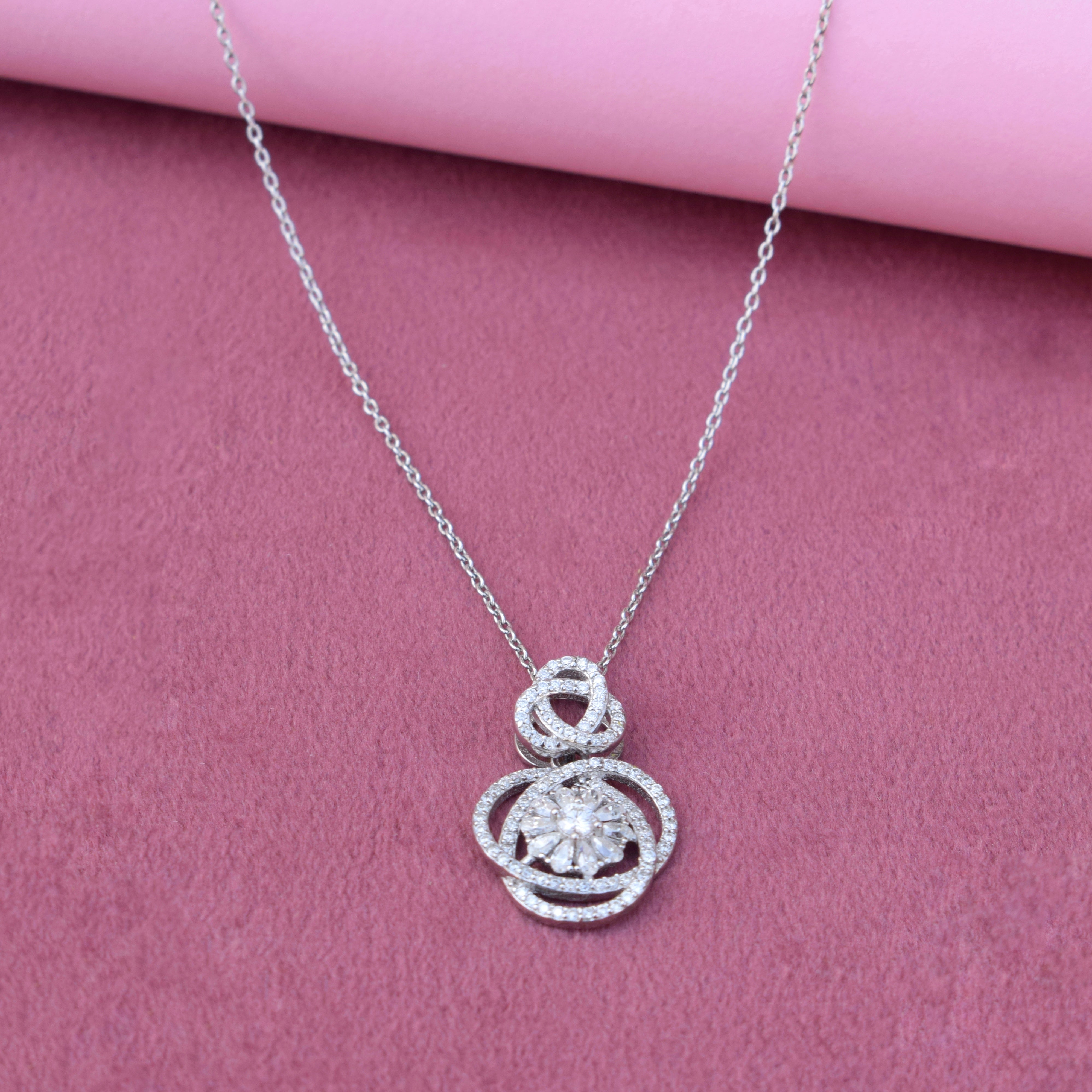 Infinity Love Knot Silver Pendant in Silver with Moissanite