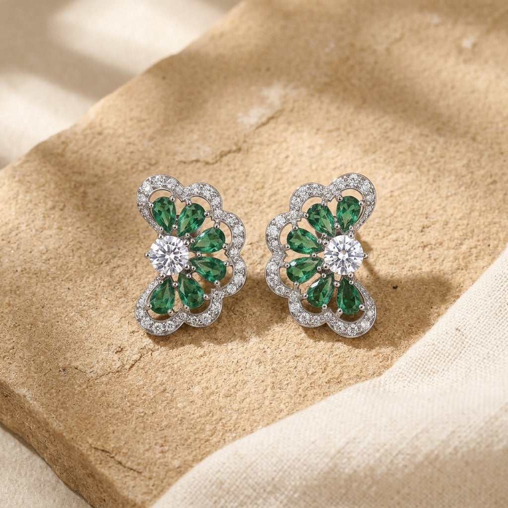 Lab Grown Emerald Demi-Bloom Studs Earrings in Sterling Silver with Moissanite