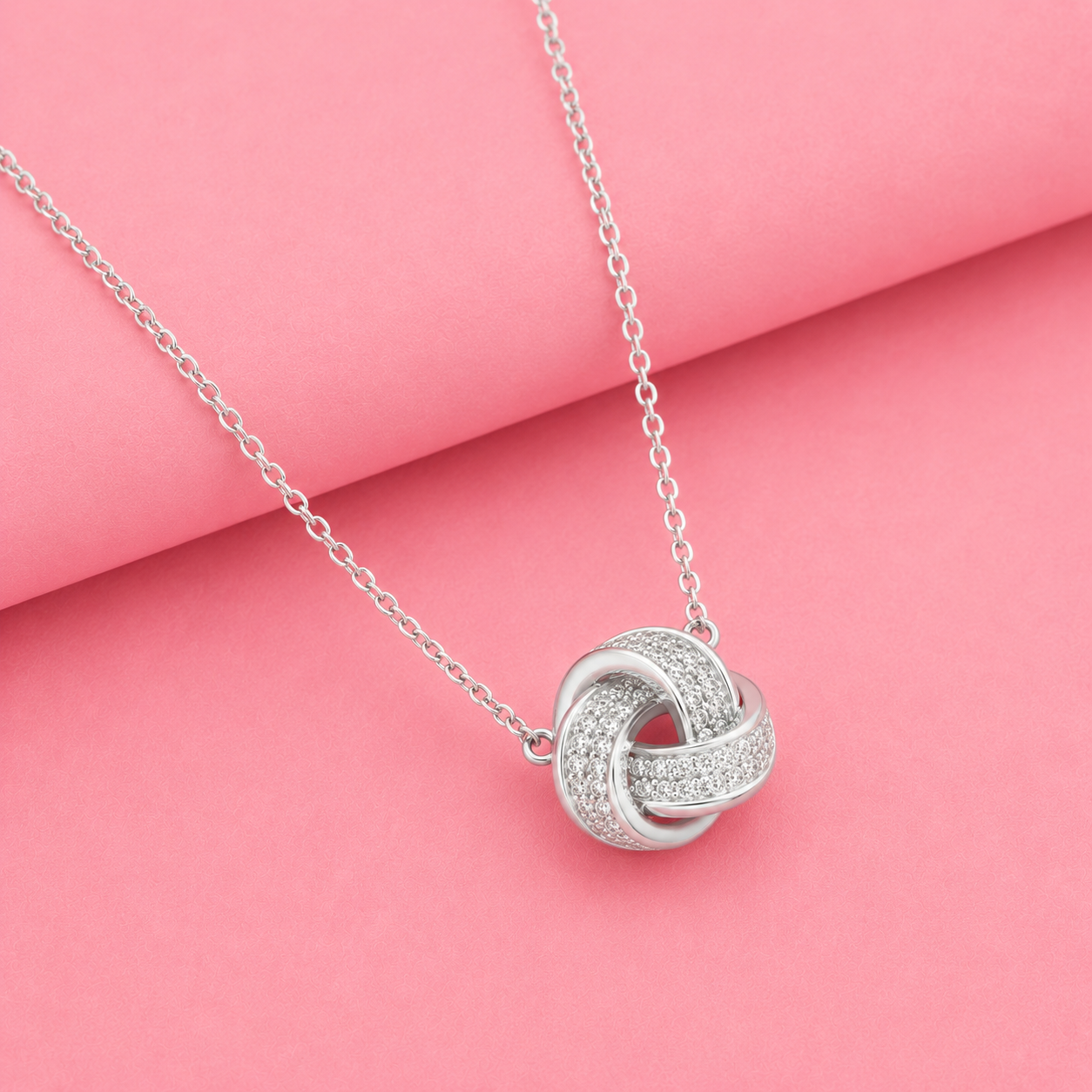 Love knot Moissanite Pendant in Sterling Silver