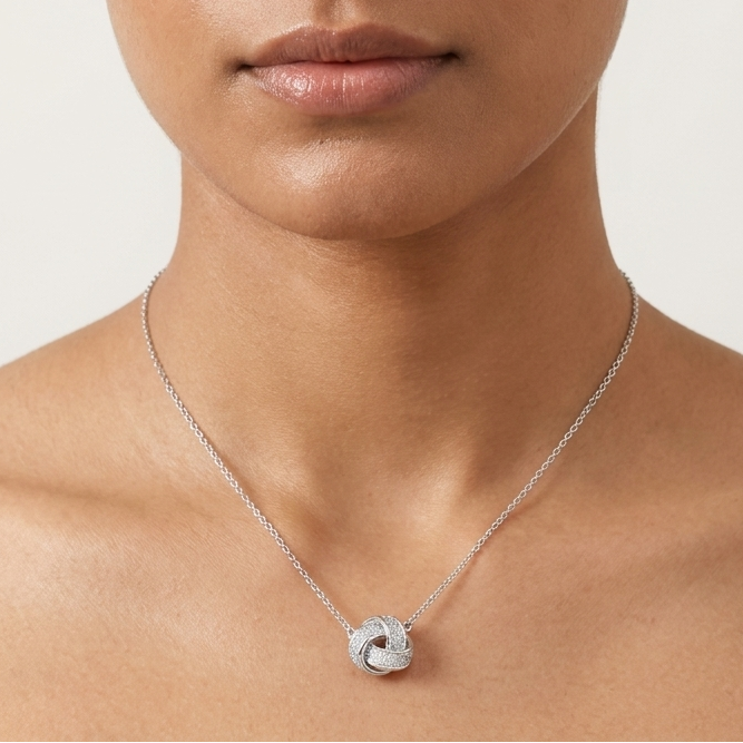 Love knot Moissanite Pendant in Sterling Silver
