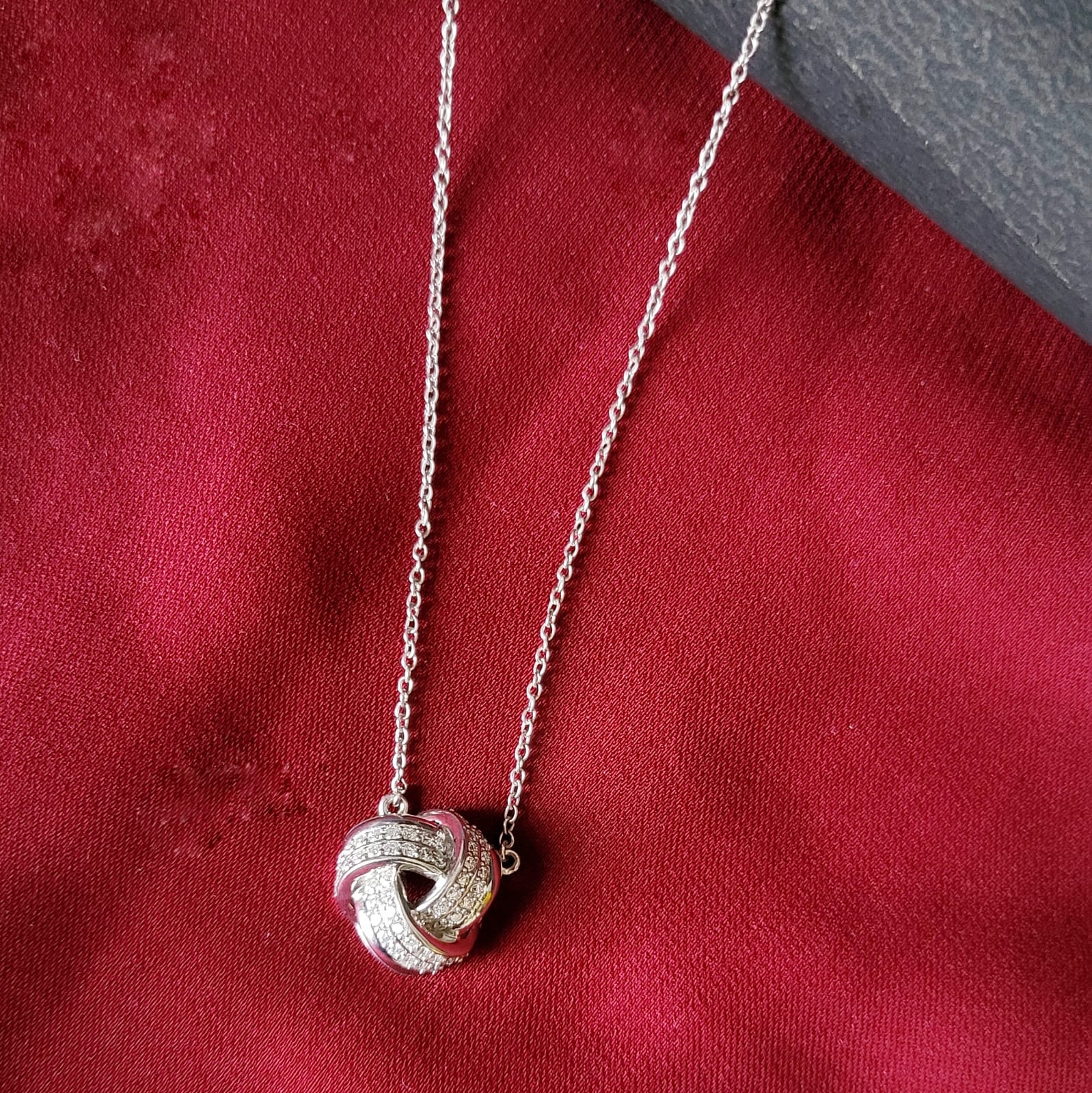 Love knot Moissanite Pendant in Sterling Silver