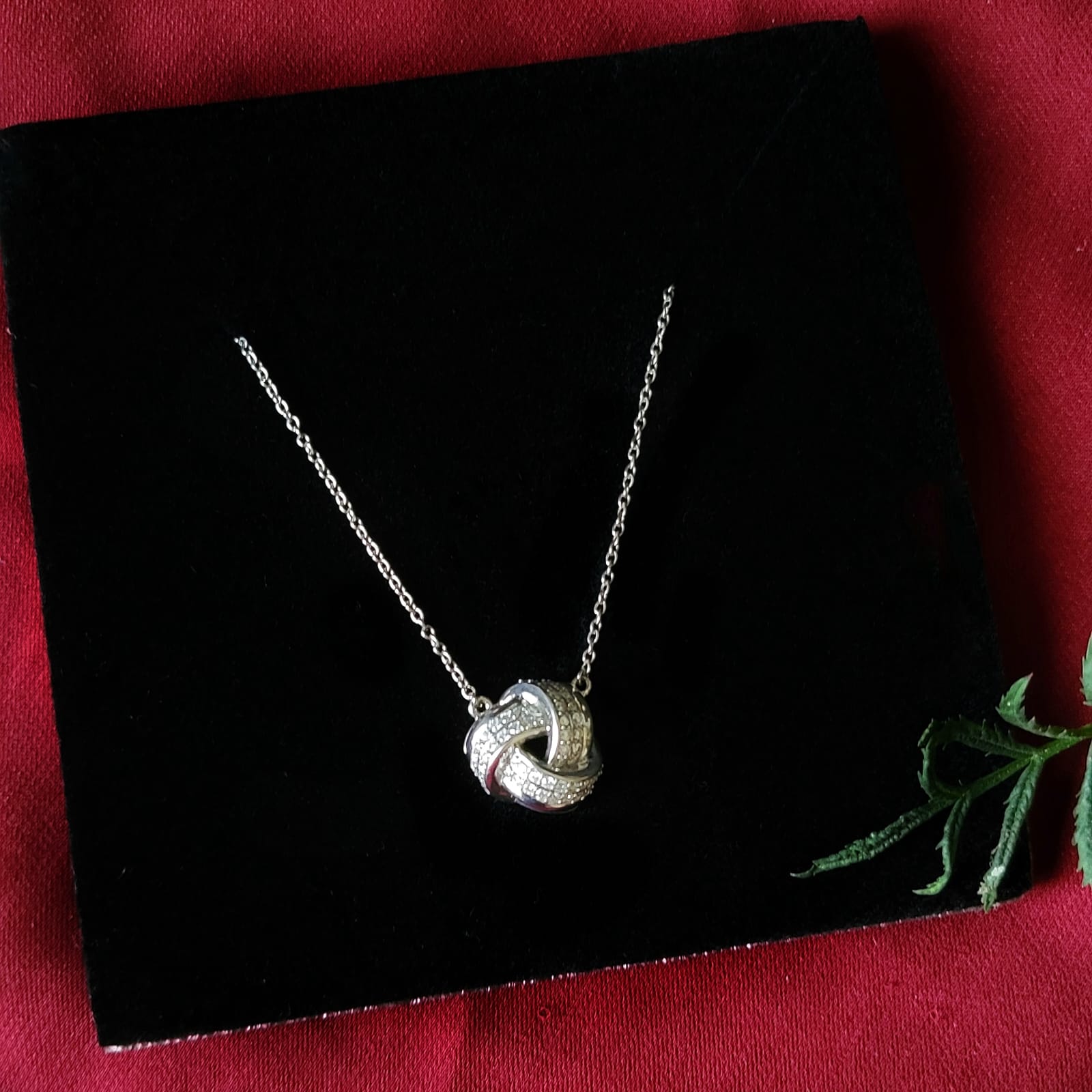 Love knot Moissanite Pendant in Sterling Silver