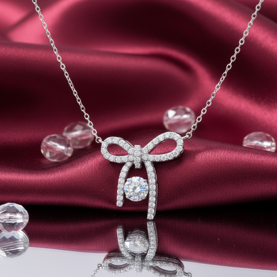 Sterling Silver Elegant Bow Pendant with Moissanite