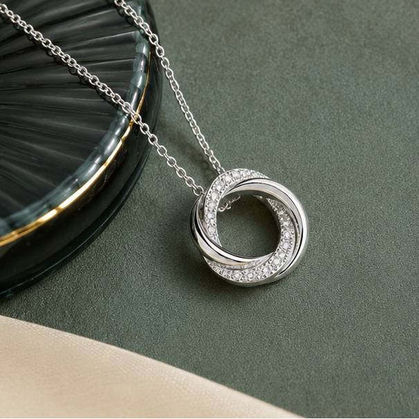 Twisted Round Moissanite Pendant in Sterling SIlver with Moissanite