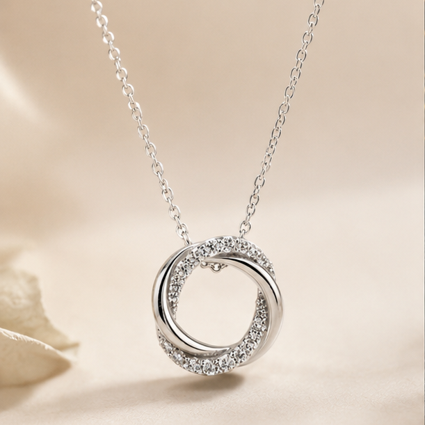 Twisted Round Moissanite Pendant in Sterling SIlver with Moissanite