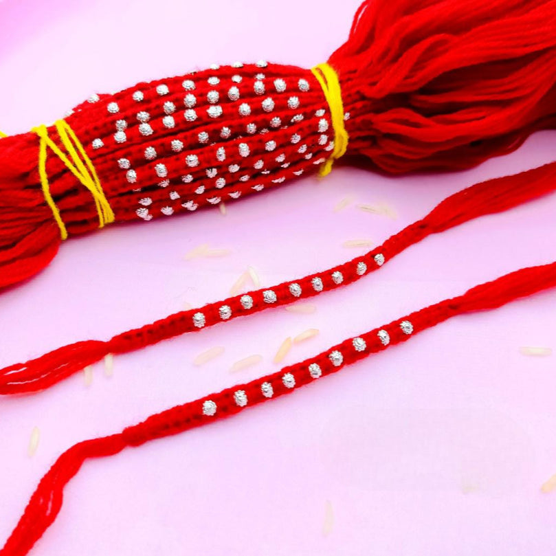 9 Flower with Red & Yellow wool Thread Silver Rakhi