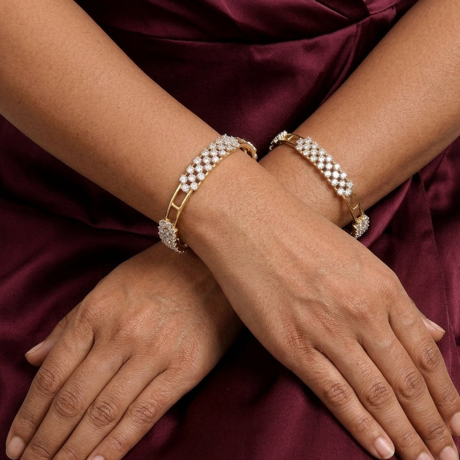 Regal Spark Moissanite Bangles in Sterling Silver in Gold Rhodium