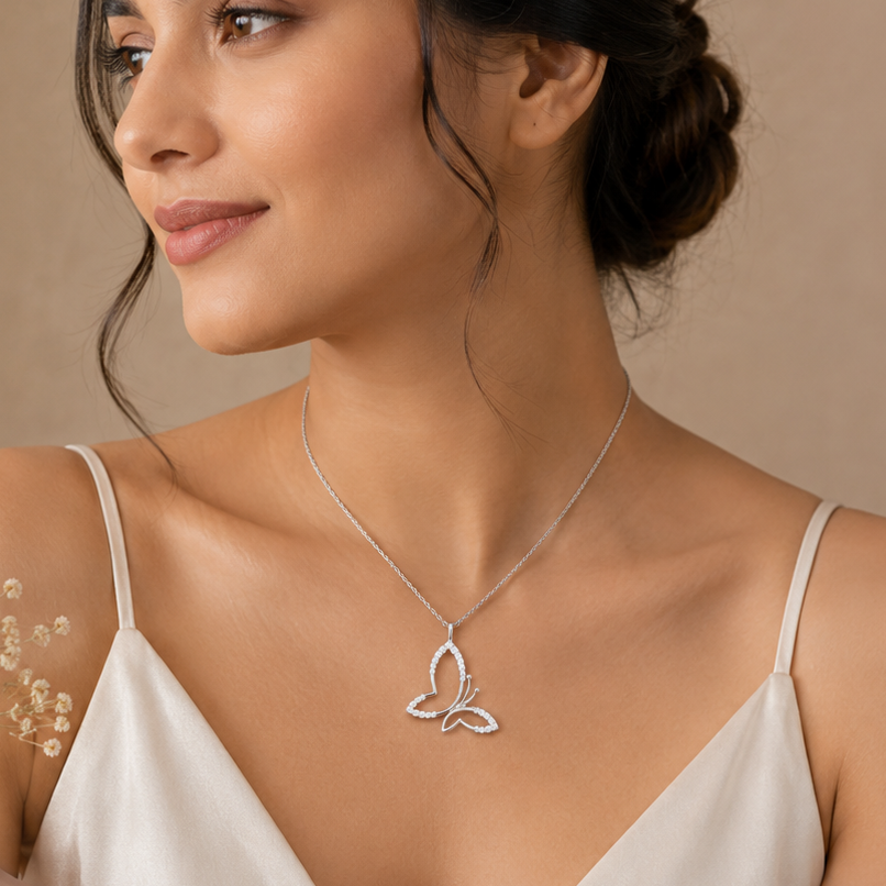 Cute Butterfly Pendant in Sterling Silver with Moissanite
