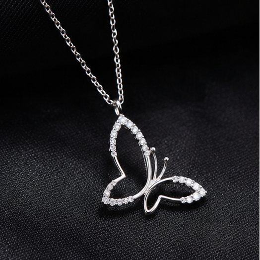 Cute Butterfly Pendant in Sterling Silver with Moissanite