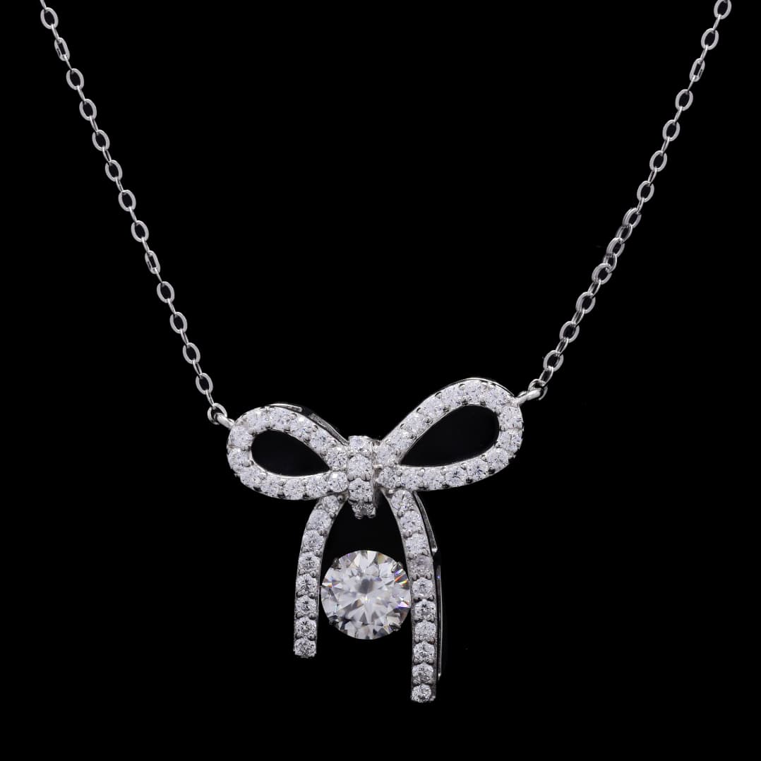 Sterling Silver Elegant Bow Pendant with Moissanite