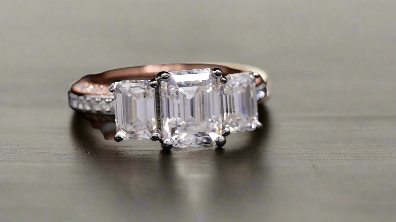 3 stone Emerald cut Ring