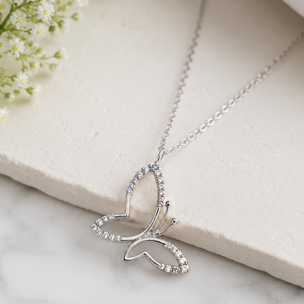 Cute Butterfly Pendant in Sterling Silver with Moissanite