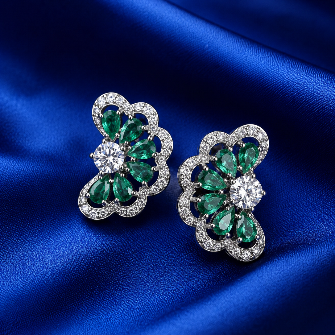 Lab Grown Emerald Demi-Bloom Studs Earrings in Sterling Silver with Moissanite