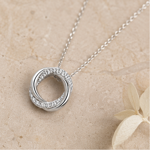 Twisted Round Moissanite Pendant in Sterling SIlver with Moissanite